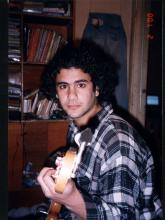 Alaa plays the bass